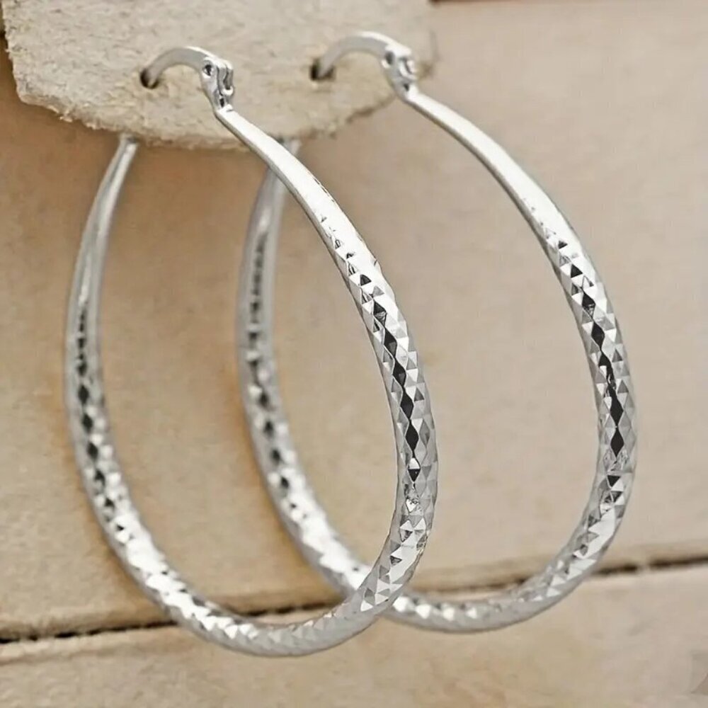 Silvery Hoop Earrings. CL